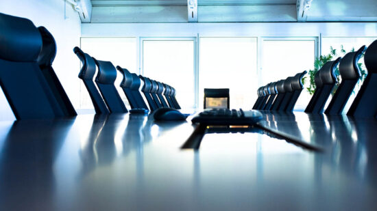 Conference room with large table and many chairs