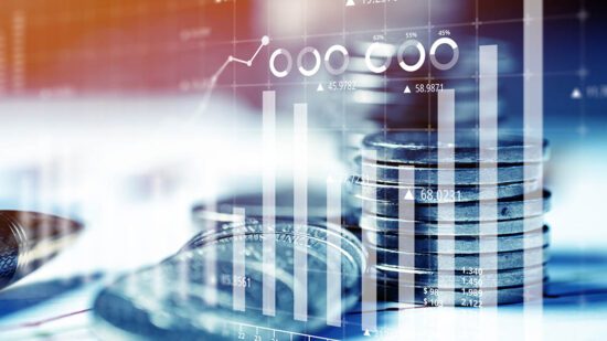 Money and business concept. Reporting charts on investment and success against the background of coins