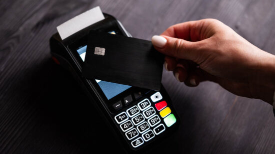 Girl Paying By Credit Card With Wireless Pos Terminal