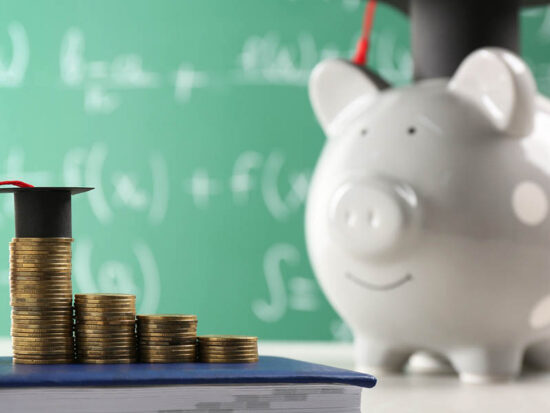 Scholarship concept. Coins, graduation cap and book on light grey table, space for text