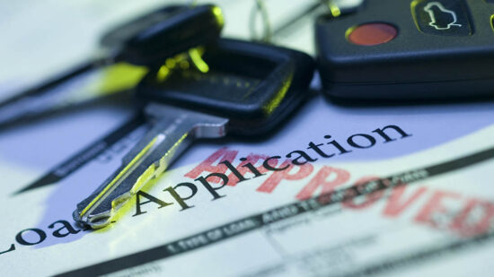 Car keys and approved loan application